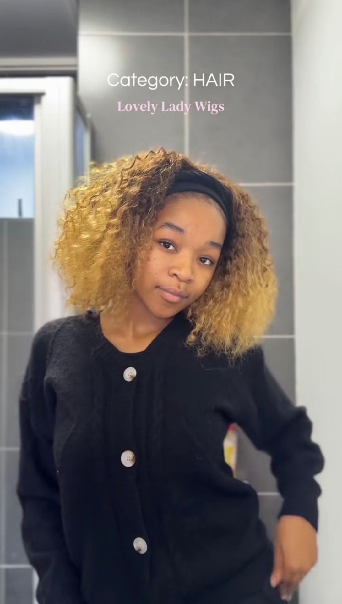 Customer wearing a short honey blonde curly Lovely Lady wig with a headband